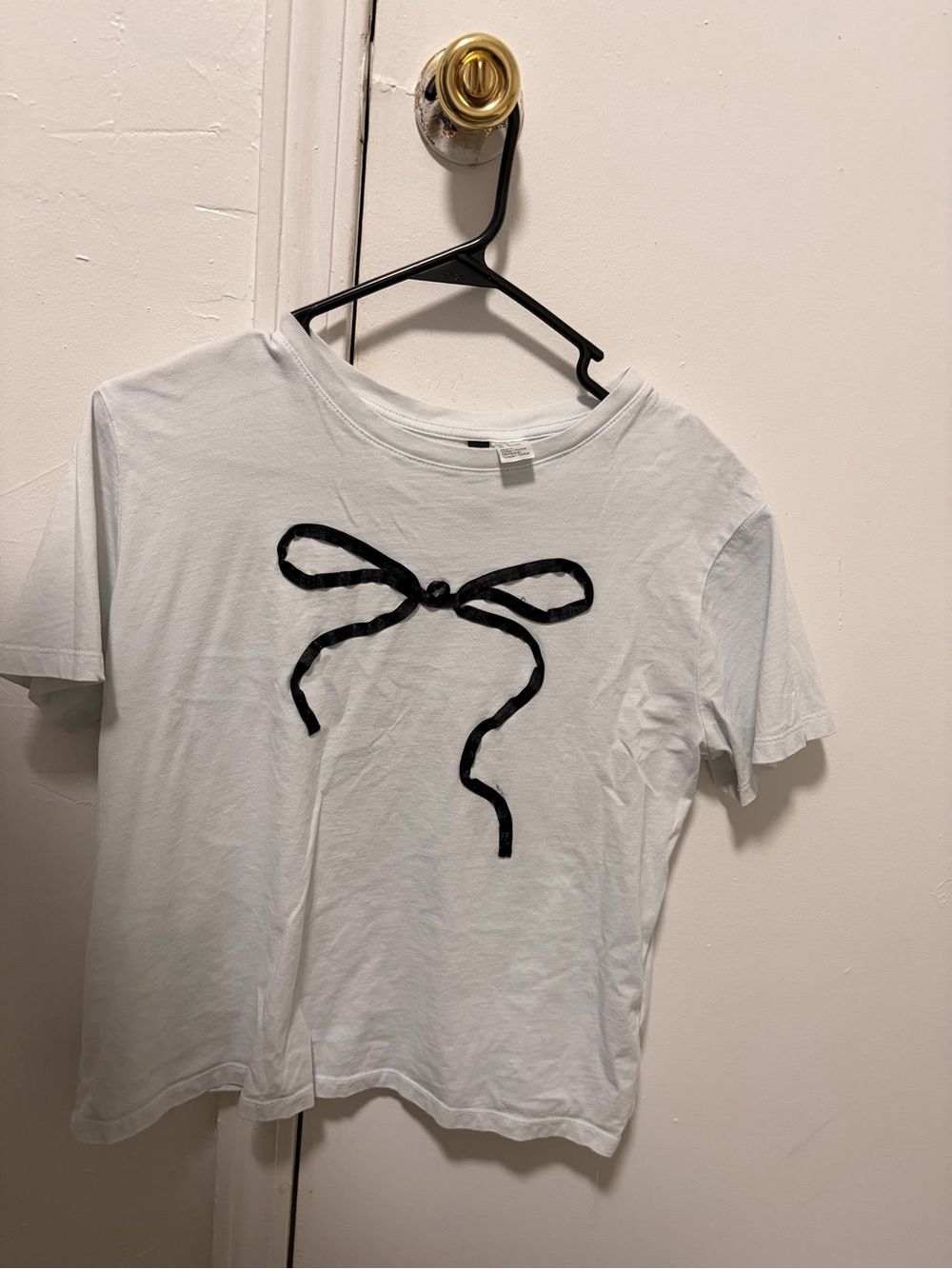 H&M White Short Sleeve Tee with Black Bow Applique